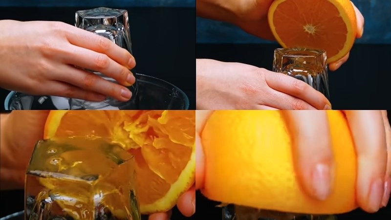 Vắt cam bằng cốc thủy tinh