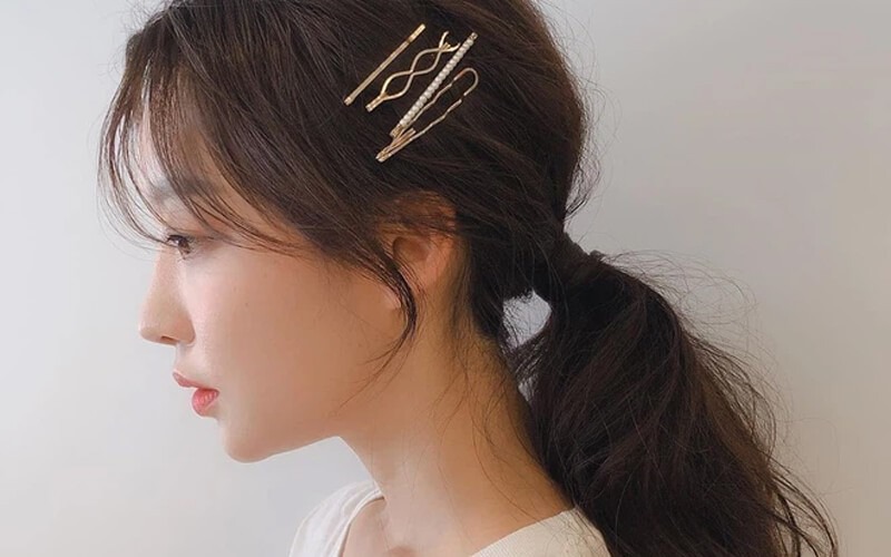 Kiểu buộc tóc giúp bạn che giấu được khuyết điểm cho gương mặt tròn
