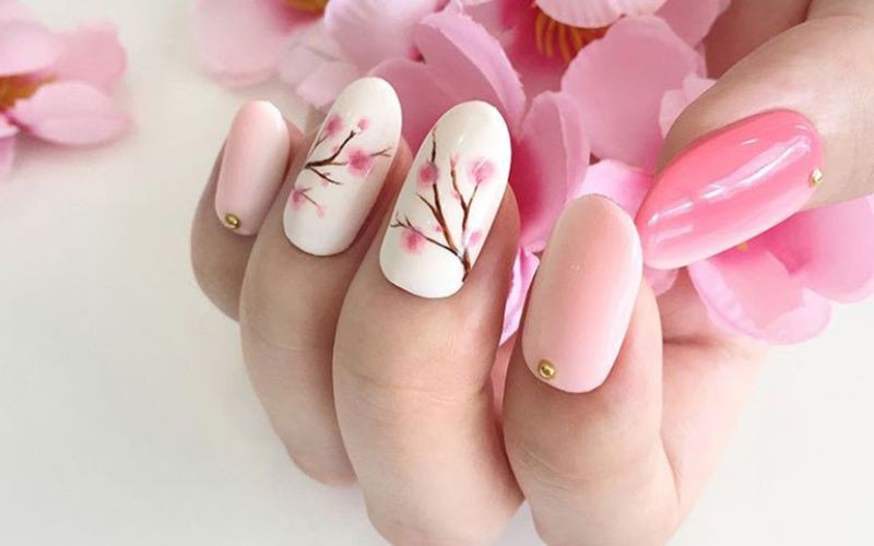 Mẫu nail hồng họa tiết hoa anh đào dễ thương